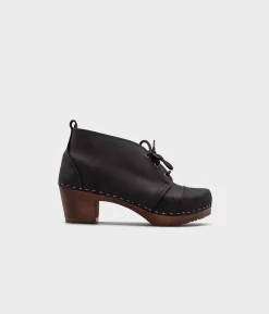 Chukka cap toe clog boots