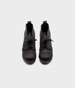 Chukka cap toe clog boots