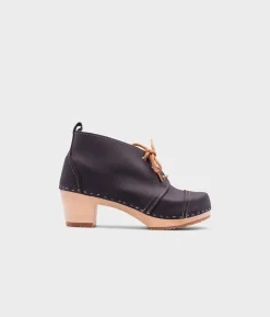 Chukka cap toe clog boots