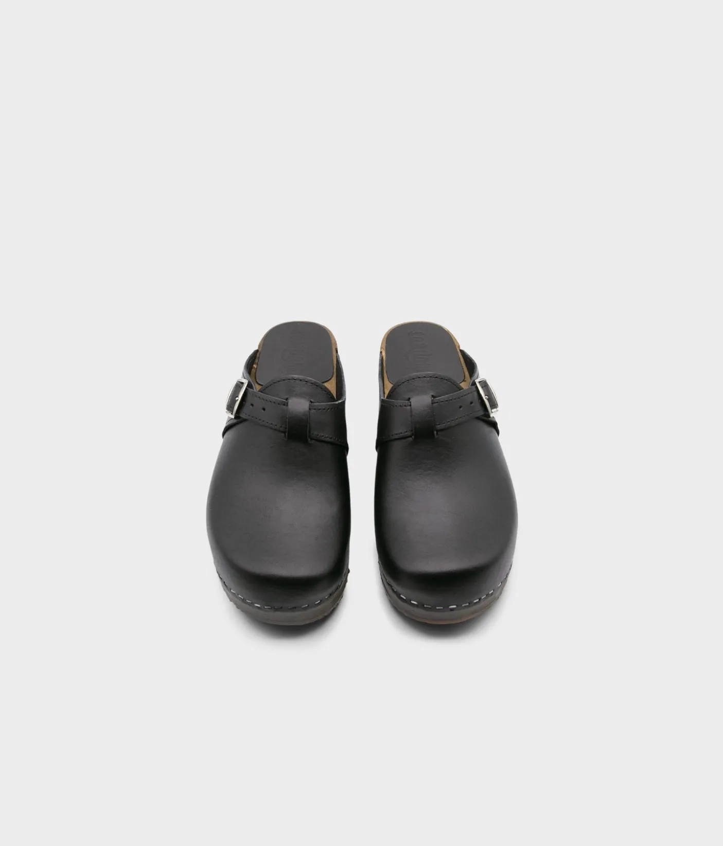 Halmstad buckled clog mules